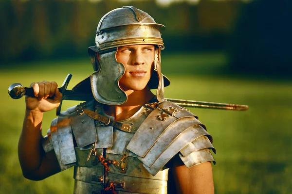 One Brave Roman soldier in field. — Stock Photo, Image