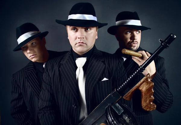 Three gangsters. Stock Image