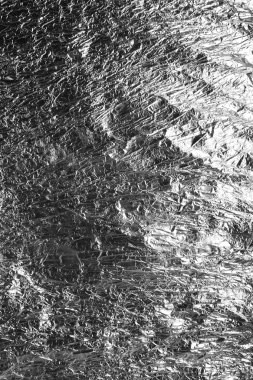 Texture of crumpled foil paper close up clipart