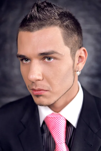 Young sexy macho in suit — Stock Photo, Image