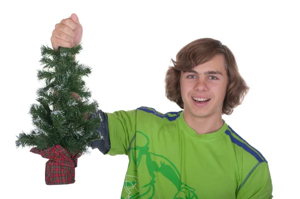 Teenager hält einen Weihnachtspelz in der Hand — Stockfoto