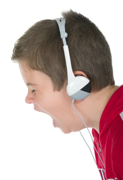 Kleiner Junge mit Ohrhörern — Stockfoto
