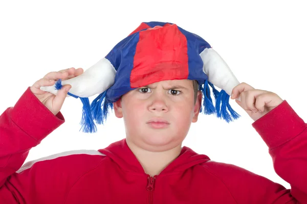 Nespokojený chlapec v přilbě ventilátor — Stock fotografie