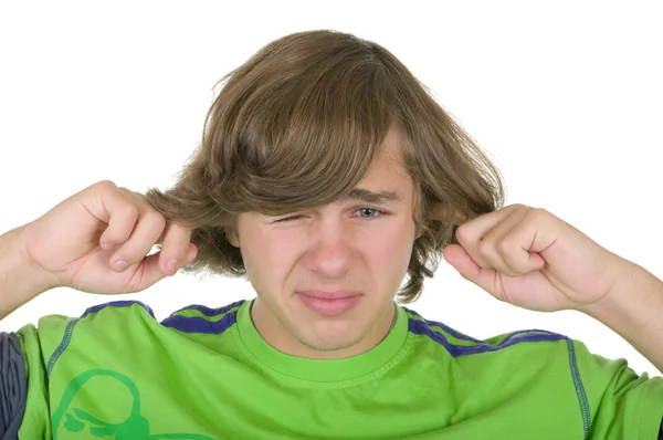 Tinédzser bezárja füle ujjak — Stock Fotó