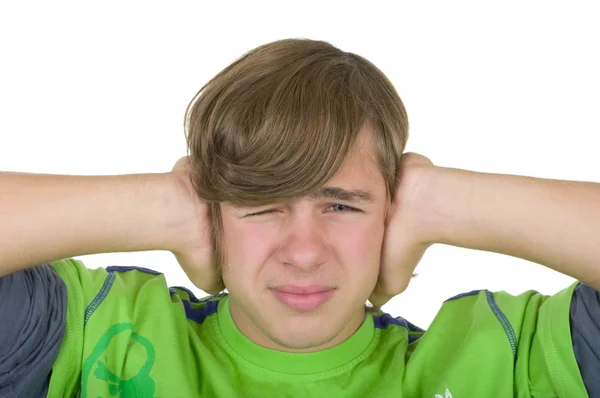 Teenager zavře uši — Stock fotografie