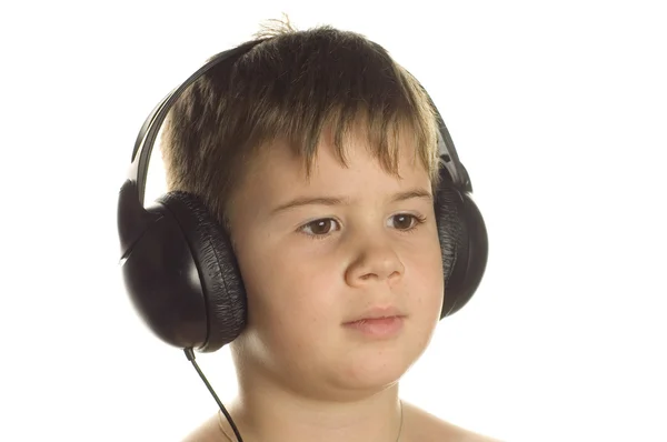 その少年は音楽に耳を傾け — ストック写真