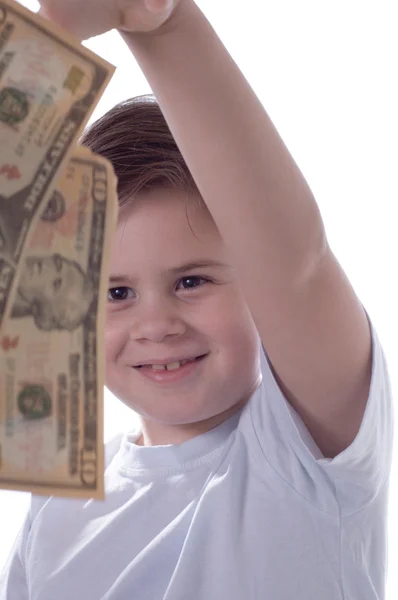 Мальчик бросает деньги — стоковое фото