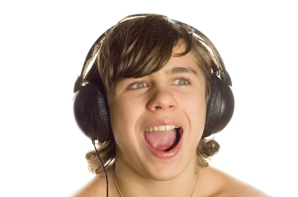 O menino ouve música — Fotografia de Stock