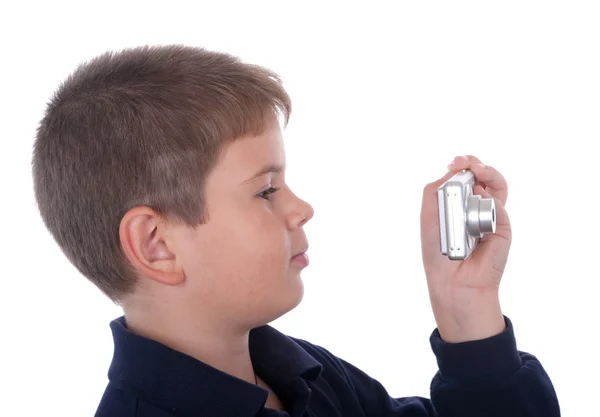 Маленький хлопчик фотографує камеру — стокове фото