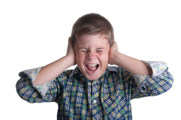 Pojken stänger öron — Stockfoto