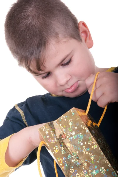 Boy searches for a gift — Stock Photo, Image