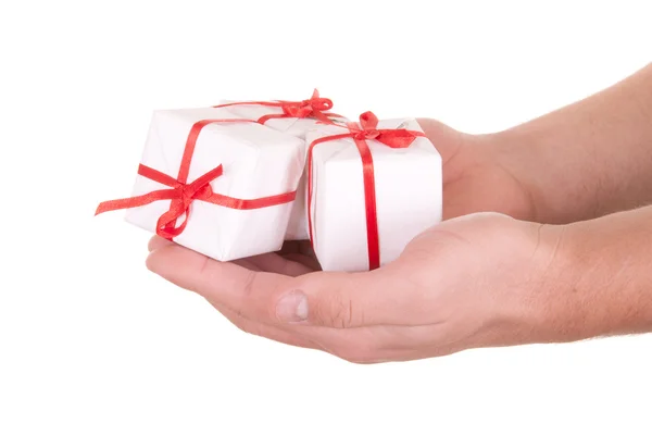 Boxes with gifts in palms — Stock Photo, Image