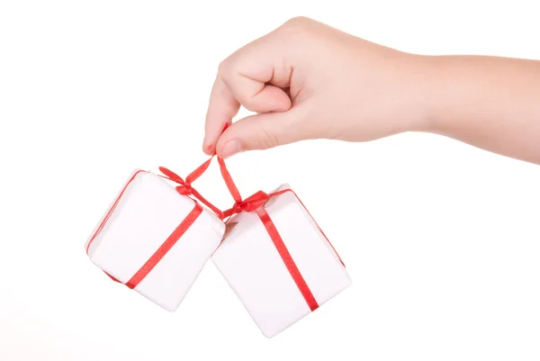 Hand holds boxes with gifts — Stock Photo, Image