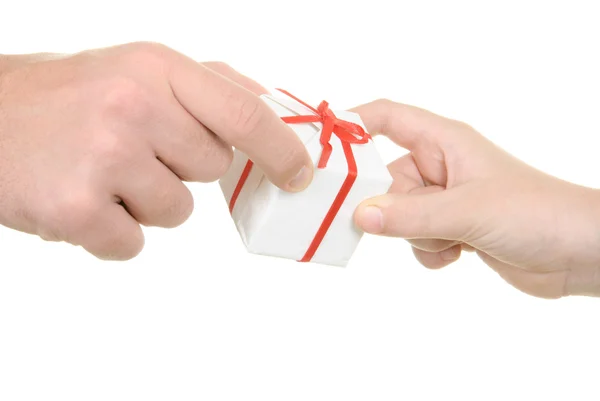 Two hands and gift — Stock Photo, Image