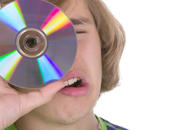 Pojke med en optisk disk — Stockfoto