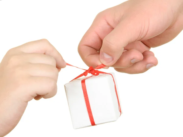 Two hands hold box with gift — Stock Photo, Image