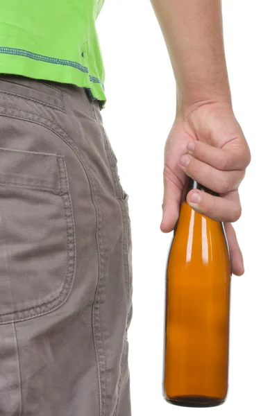 Tiener houdt een fles vast — Stockfoto