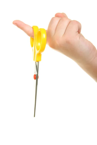 Tesoura amarela pendurar no dedo — Fotografia de Stock