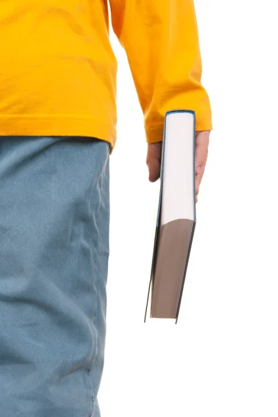 Adolescent tient livre dans la main — Photo