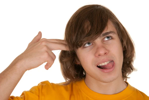 Teenager dal ruku prsty na hlavě — Stock fotografie
