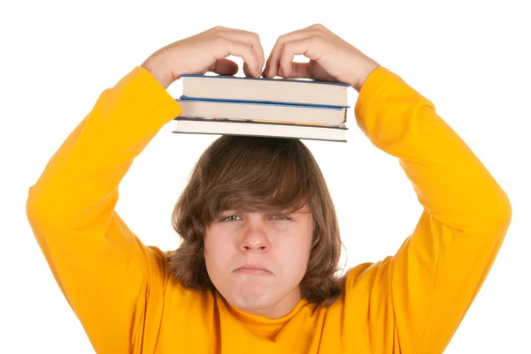 Adolescent insatisfait avec des livres — Photo