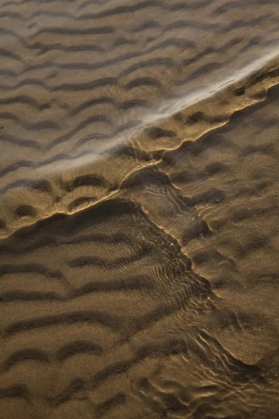 Våg och sand — Stockfoto