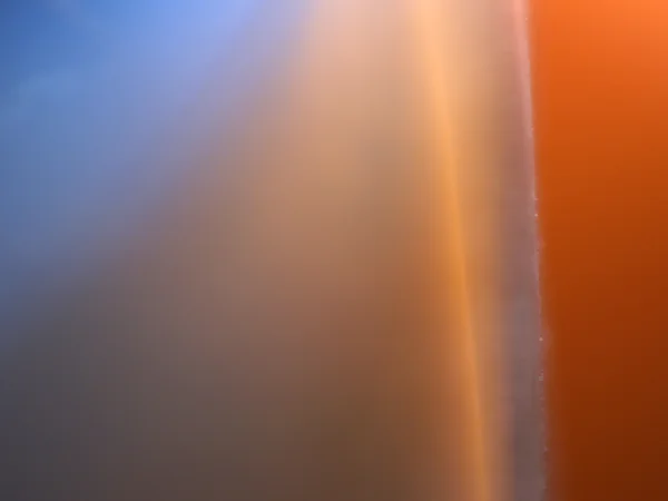 Оранжевый и синий взрыв — стоковое фото