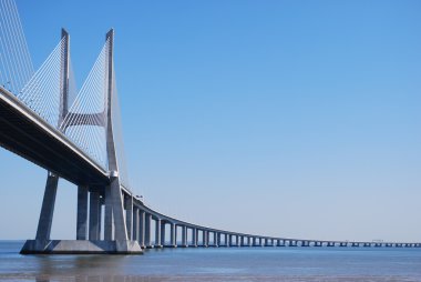 Vasco da Gama Bridge over River Tagus clipart