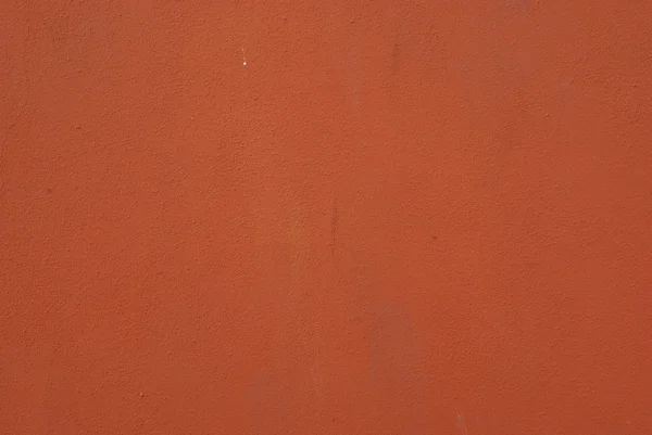 オレンジ色の壁の背景 — ストック写真