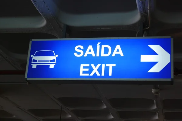 Exit sign on airport — Stock Photo, Image