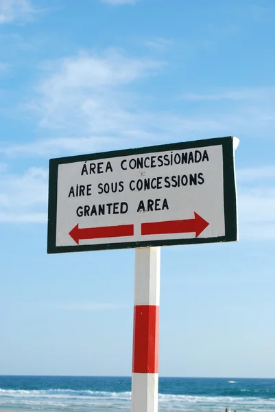 Sign at the beach (granted area) — Stock Photo, Image