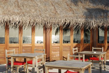 Beach restaurant view in Maldives (ocean clipart