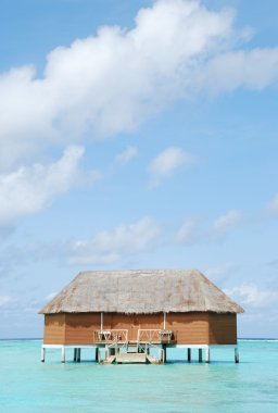 Honeymoon villa in Maldives (clouscape b clipart