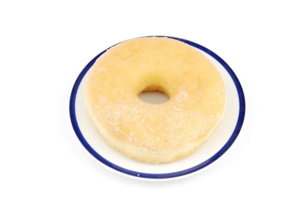 Donut sucré sur une assiette — Photo