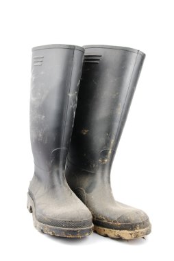 Pair of black rubber boots on white clipart