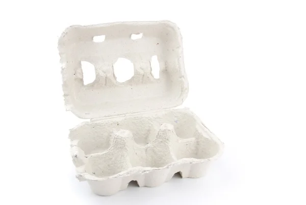 Boîte vide de 6 oeufs sur blanc — Photo