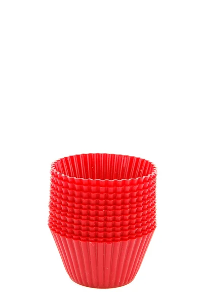 Red plastic cups for small cakes — Stock Photo, Image