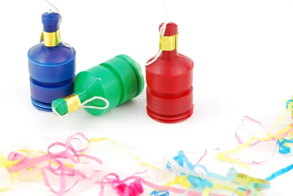 Party poppers on white — Stock Photo, Image