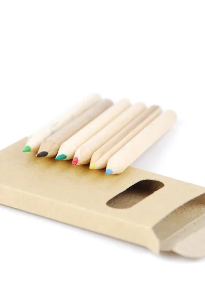 Színes ceruzák és a ceruza a fehér ügy — Stock Fotó