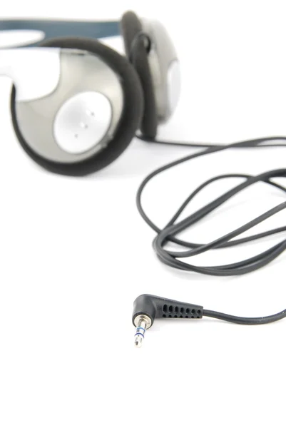 Headphones with cord on white — Zdjęcie stockowe