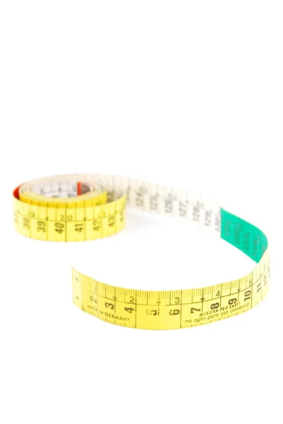 Measuring tape on white — Stock Photo, Image