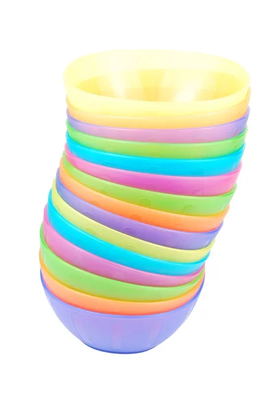 Упакованные разноцветные чаши на белом — стоковое фото