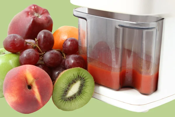 Fresh fruits and juicer — Stock Photo, Image