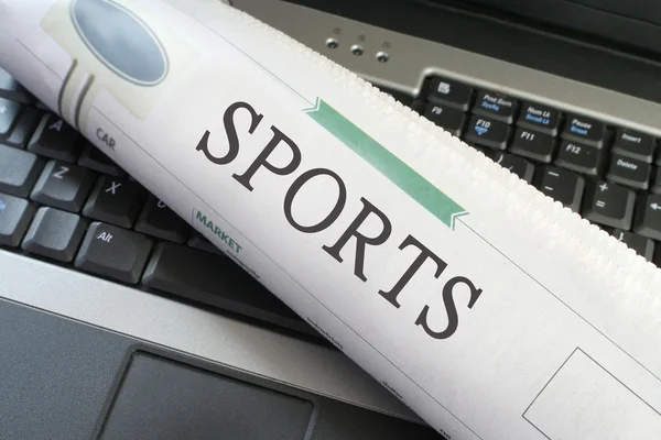 stock image Sports section on laptop