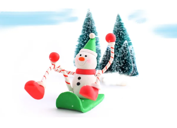 Sledding snowman — Stock Photo, Image