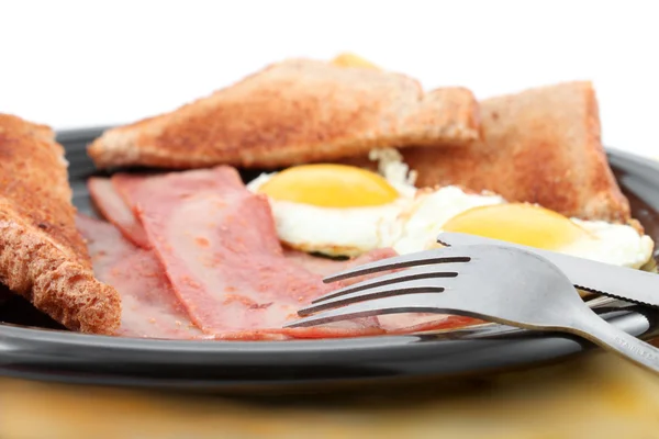 Завтрак с беконом и яйцами — стоковое фото