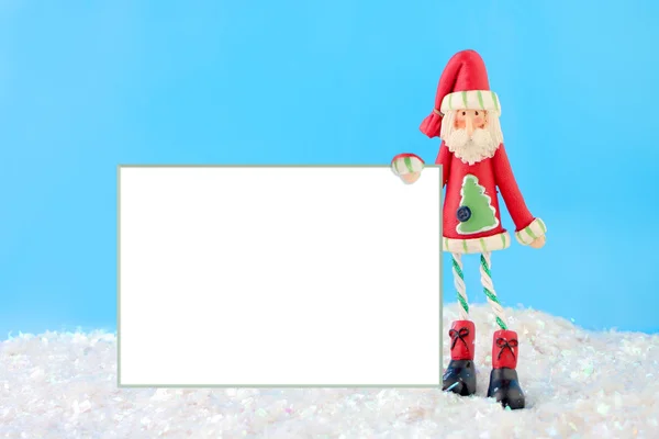 Magerer Weihnachtsmann mit leerem Schild — Stockfoto