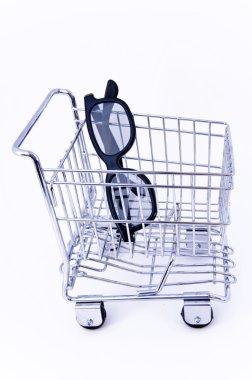 Eye glasses in shopping cart clipart