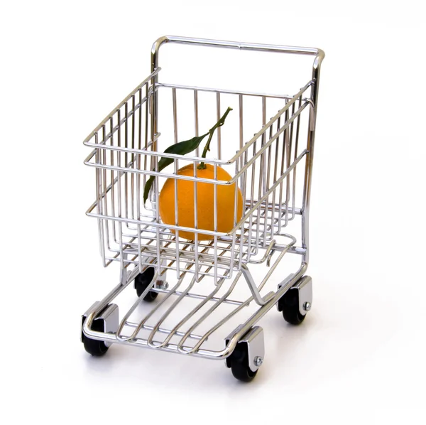 Tangerine in shopping cart — Stock Photo, Image