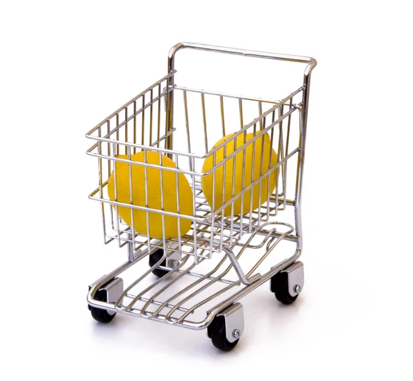 Lemon in shopping cart — Stock Photo, Image
